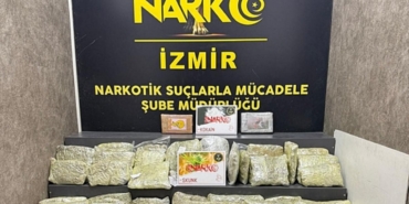 izmirde-30-kilo-406-gram-uyusturucu-ele-gecirildi-1761580965673.jpg